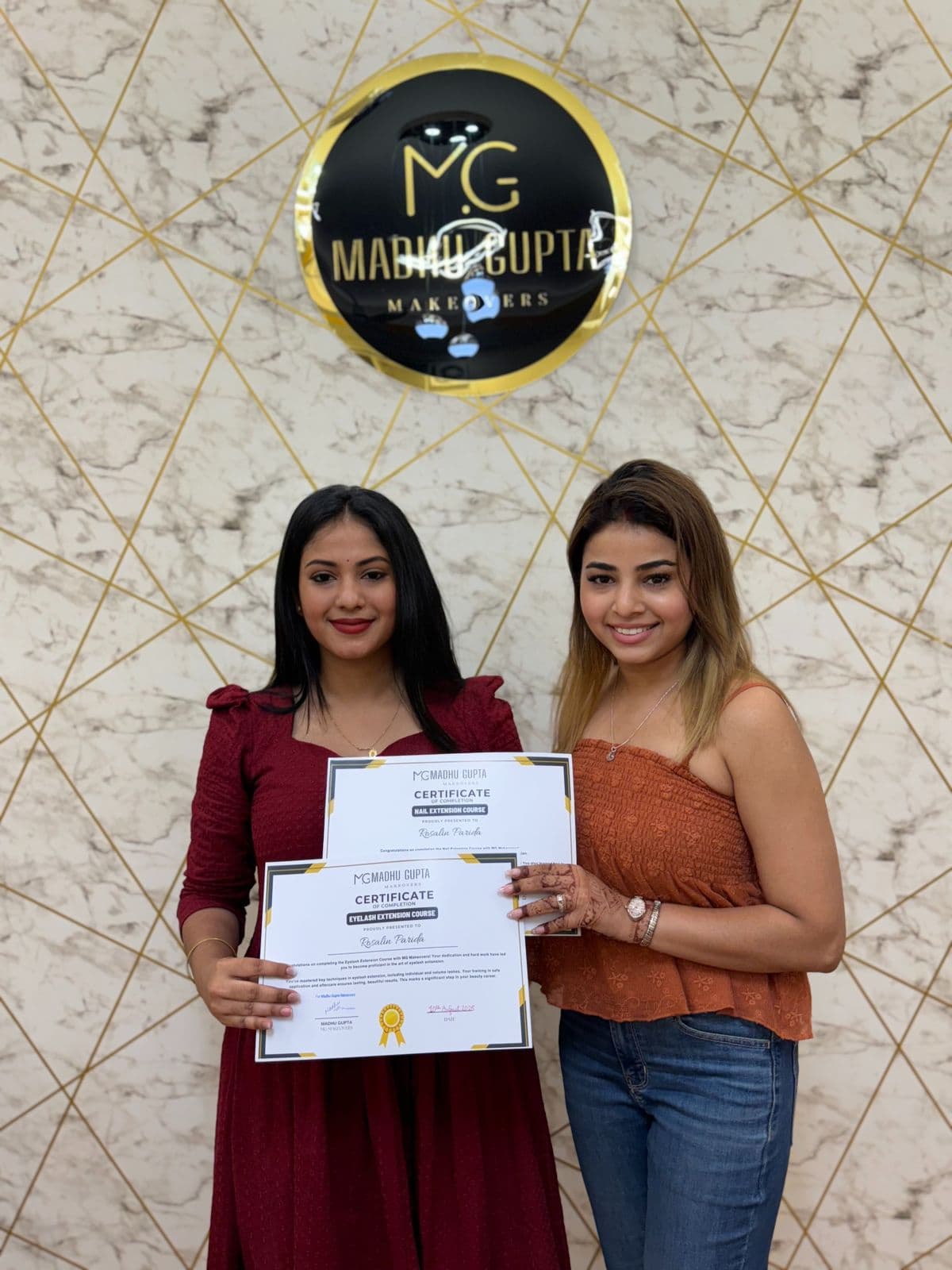 Eyelash extension course student with their MG Makeovers certificate