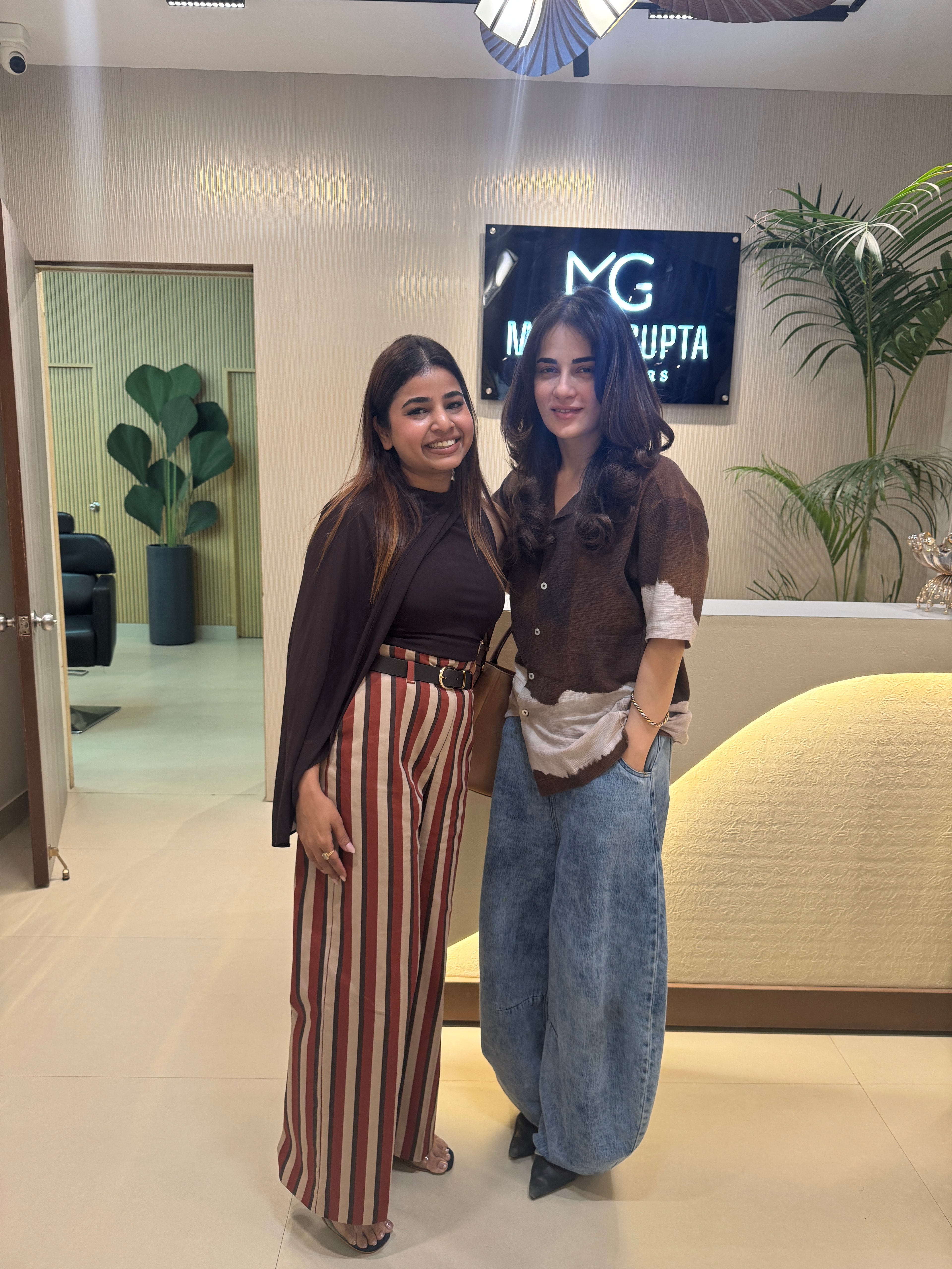 Madhu Gupta with Radhika Madan at MG Makeovers Madhu Gupta standing with Bollywood actor Radhika Madan at the MG Makeovers studio in Gurugram