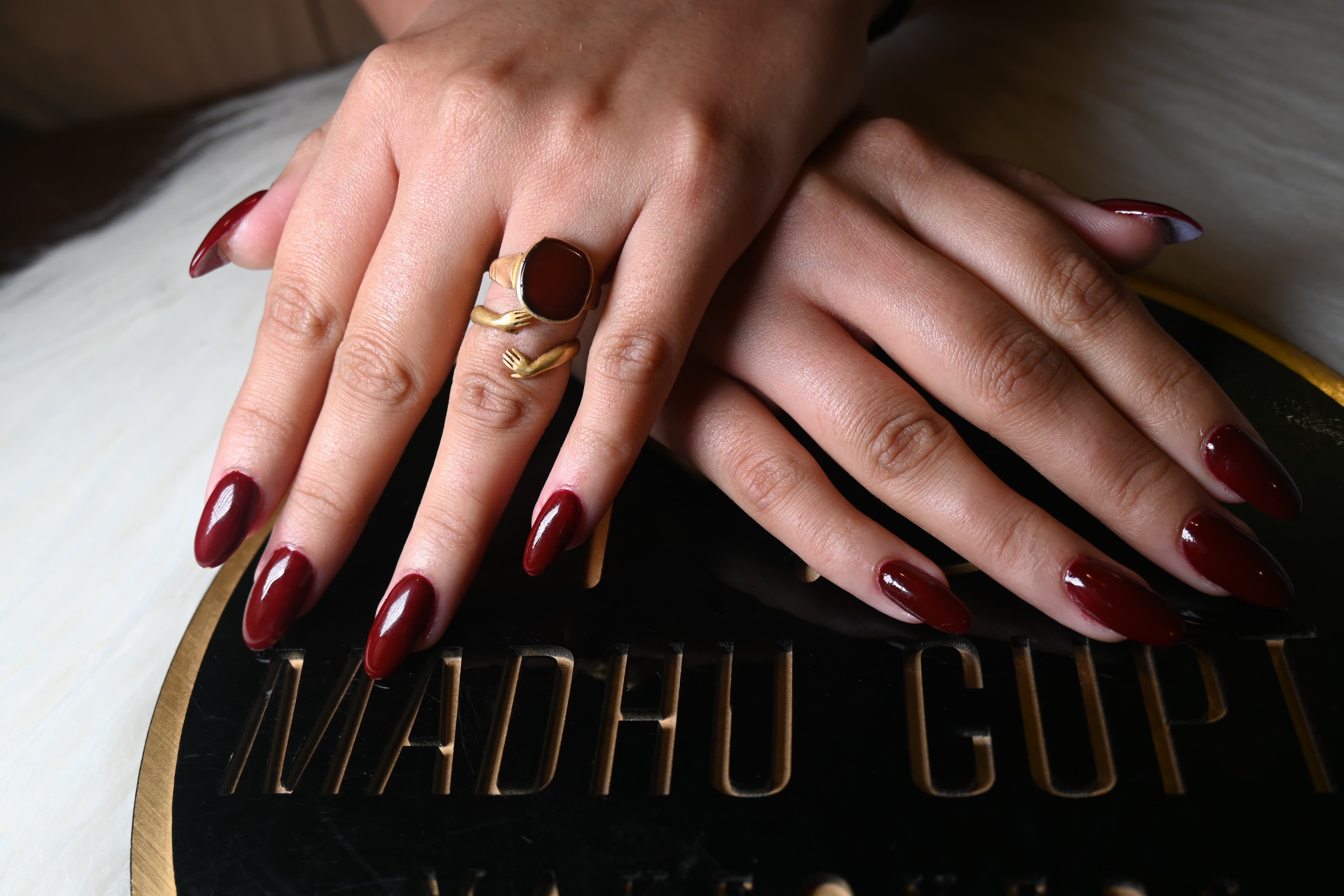 Burgundy Red Almond Nails Closeup
