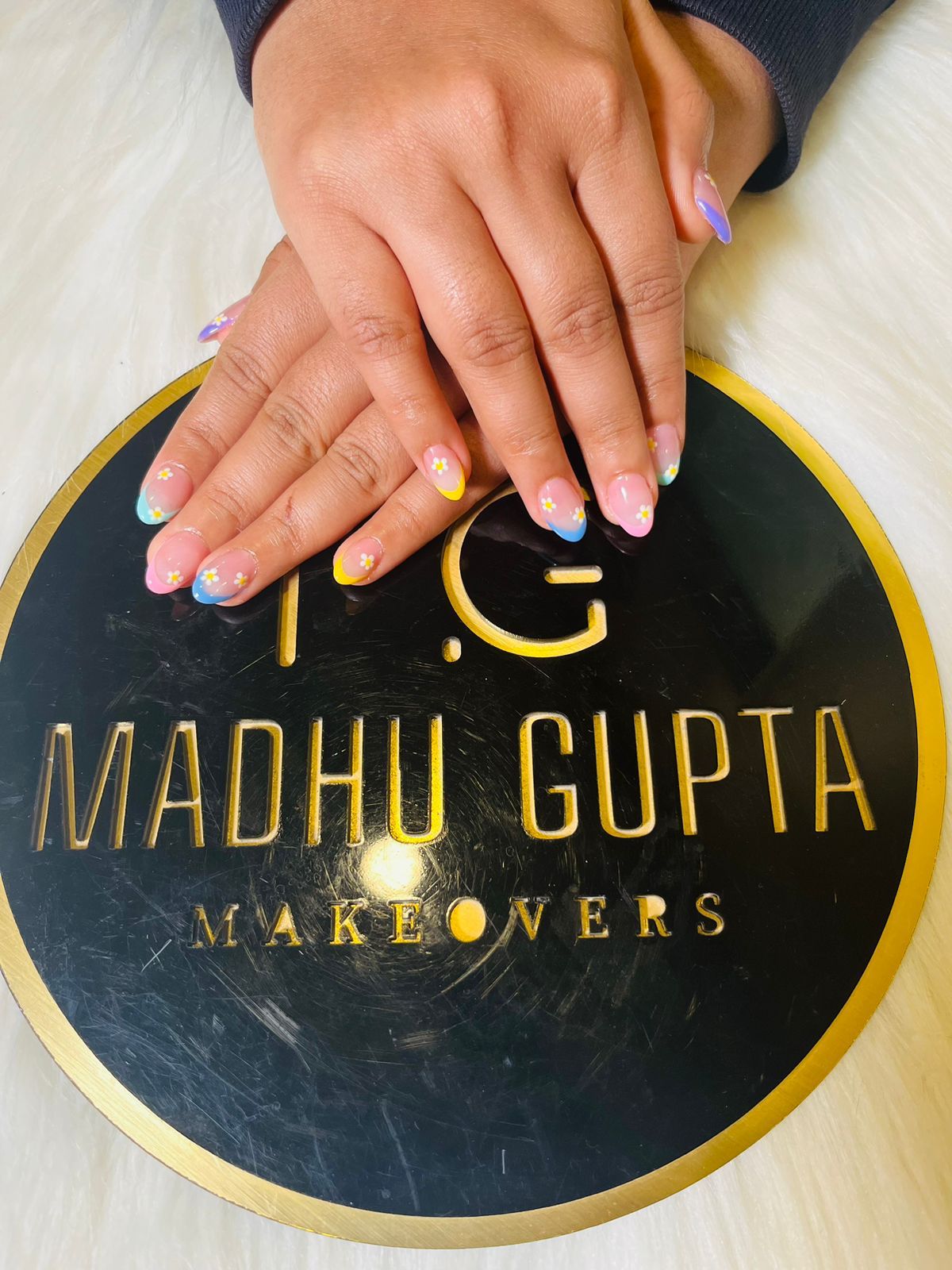 Milky pastel nail extensions with hand-painted daisy art