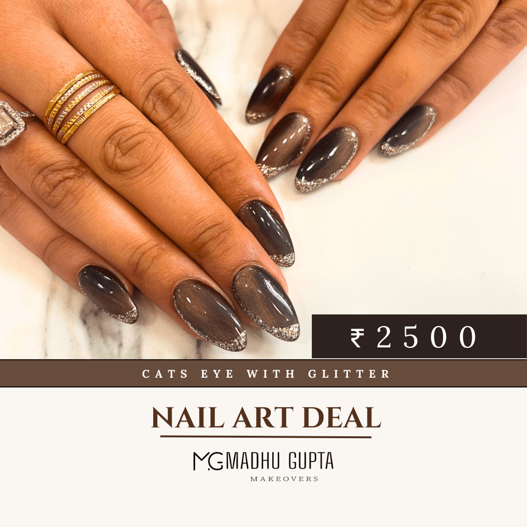 Brown cat eye magnetic nails with glitter French tips at MG Makeovers, Gurgaon