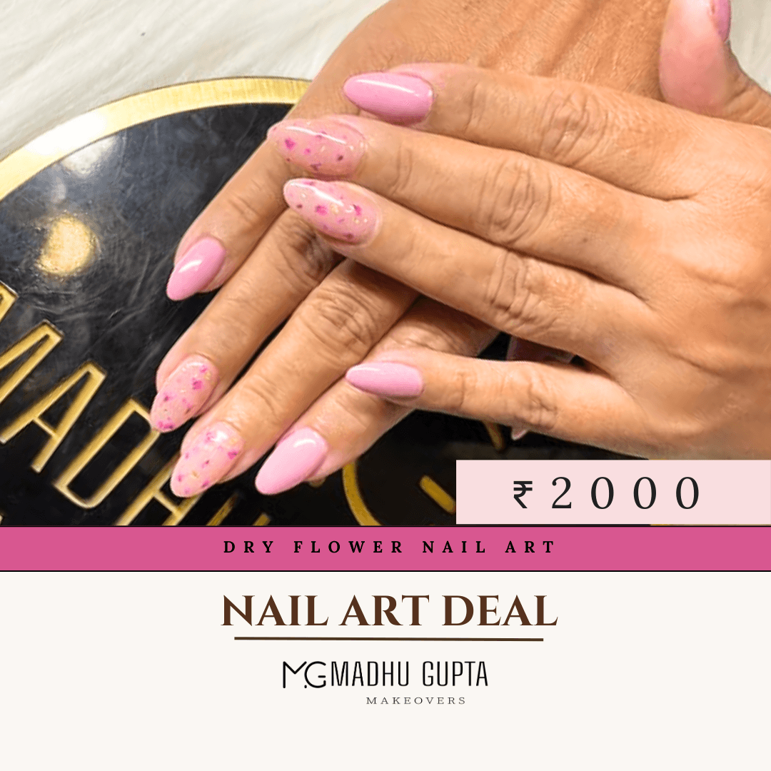 Pink nails set with dry flower petals and glitter