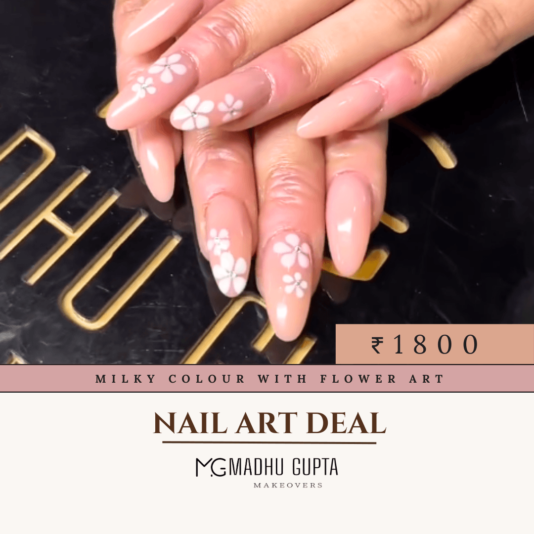 Milky pink nails with delicate hand-painted flower art